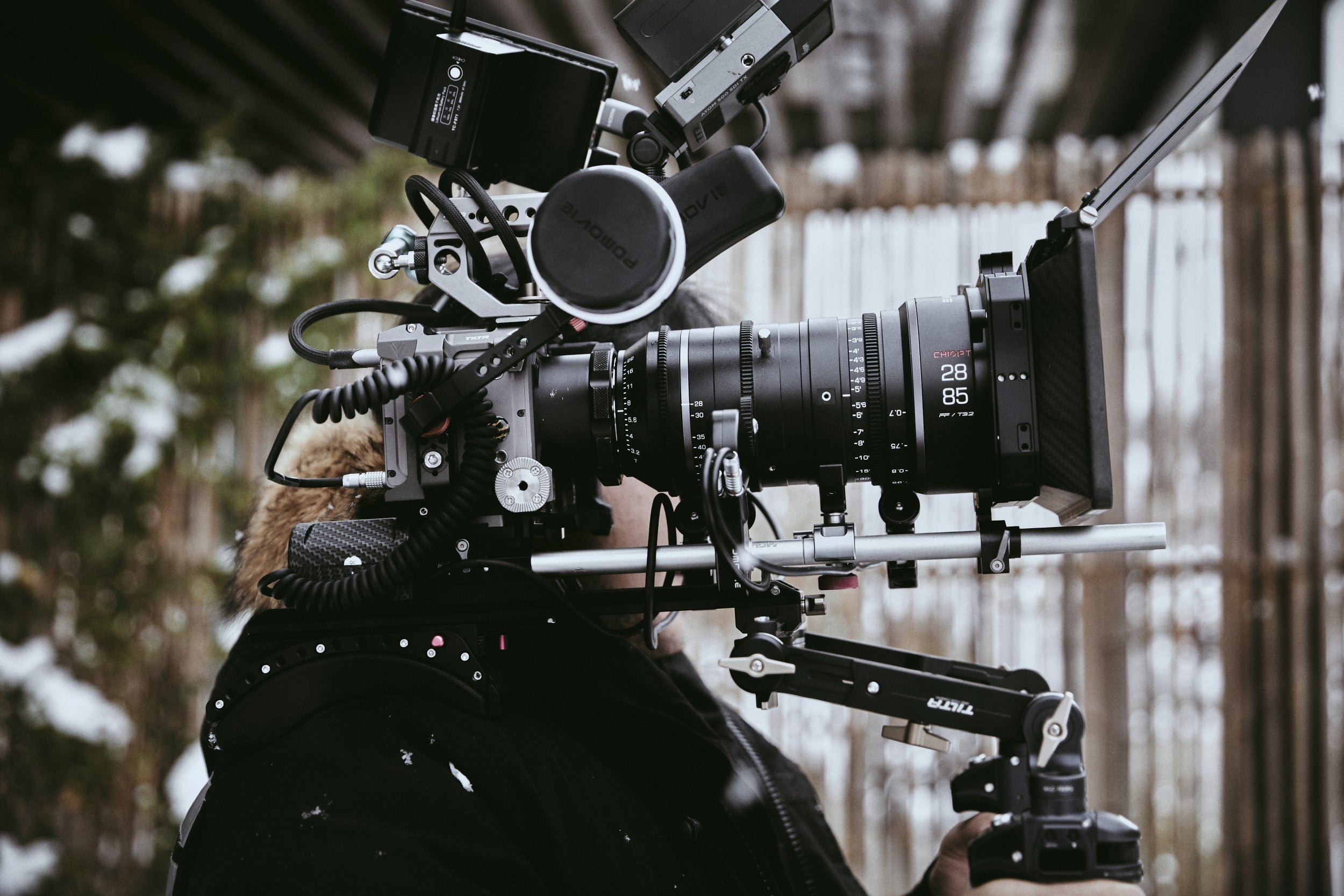 Chiopt Xtreme Zoom 28-85mm T3.2 cine lens with lightweight and all-metal design, easily carried on the shoulder for long shooting sessions, perfect for handheld with camera and professional filmmaking applications.