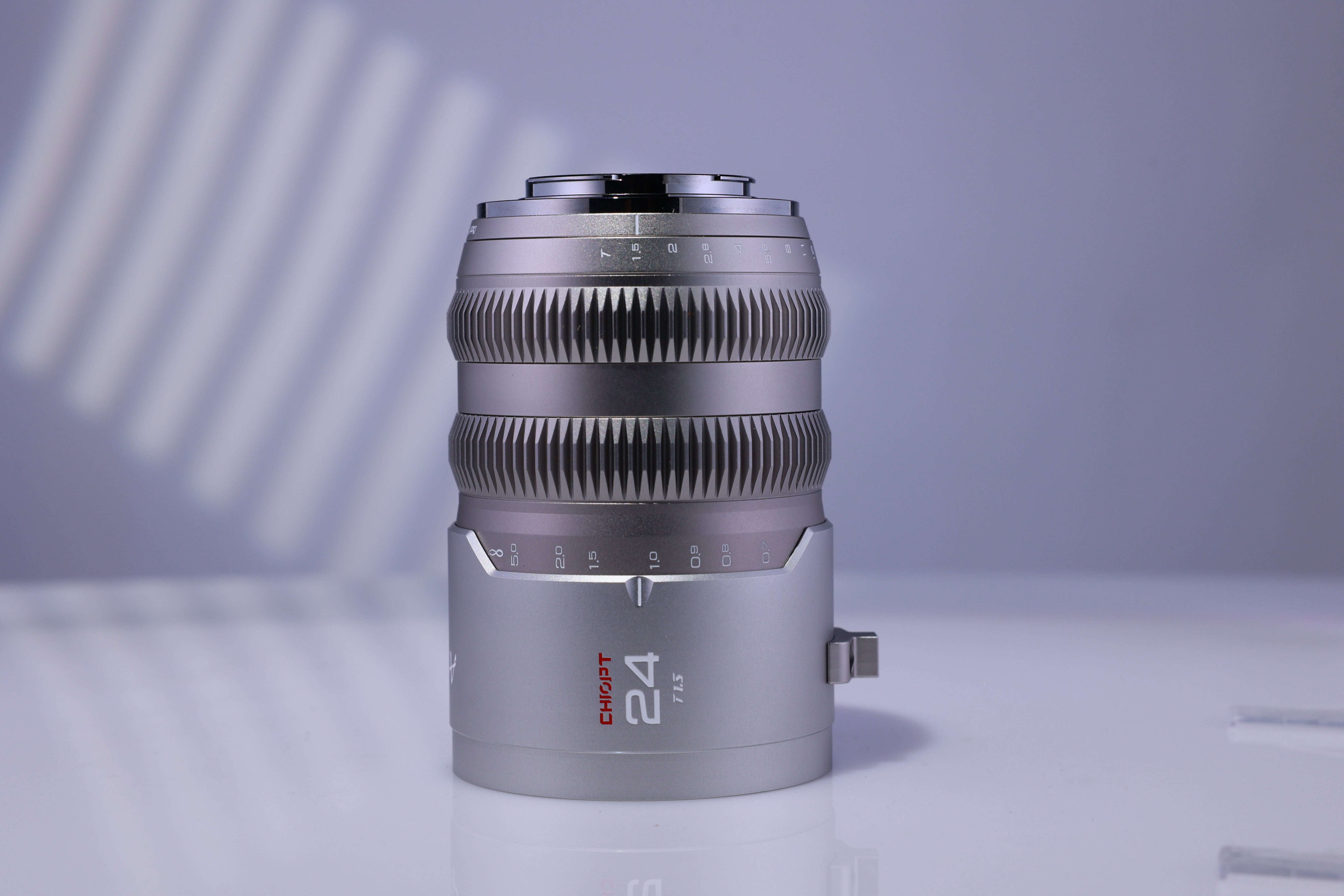 Chiopt Aura 24mm T1.5 cinema prime lens, wide-angle cine lens for 8K camera, professional filmmaking, low-light video shooting, and cinematic wide shots with excellent clarity and color accuracy.