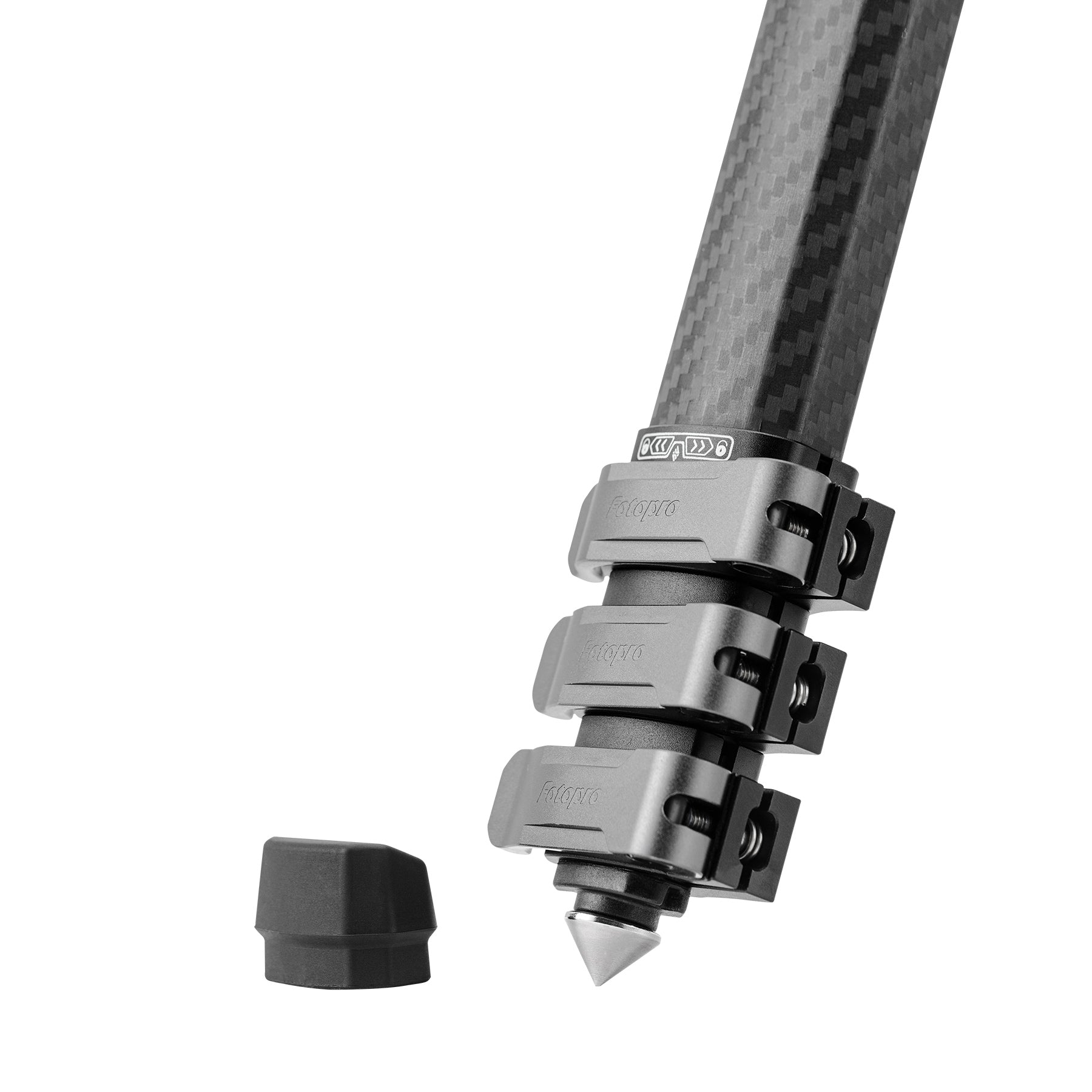 Fotopro Origin camera tripod with interchangeable spike feet and rubber pads, providing firm grip on rocky, sandy, or slippery surfaces, perfect for outdoor and travel photography.