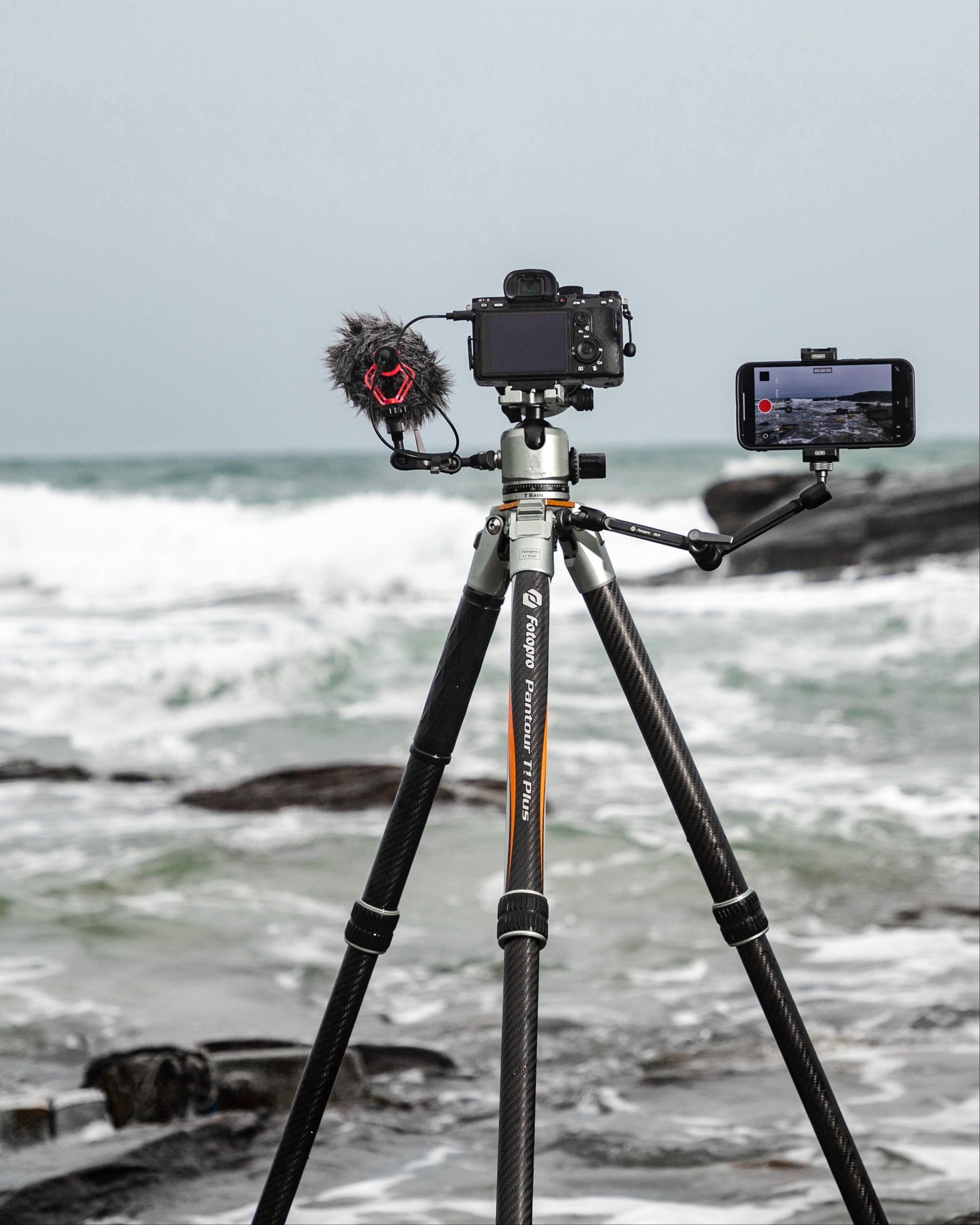 Fotopro T1 Plus camera tripod with accessory ports and magic arm, versatile adjustable tripod for photography, video shooting, and professional setups. Perfect for social media creators, outdoor photographers, travelers