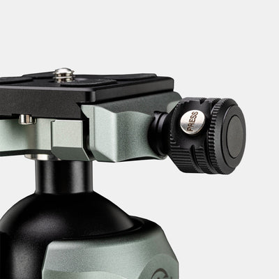 Fotopro T1 Plus carbon fiber tripod featuring Arca-Swiss quick release plate with enhanced safety lock system, secure camera mounting, fast setup, and accident prevention, compatible with DSLR, mirrorless, and cinema cameras. Perfect for travel and professional shooting.