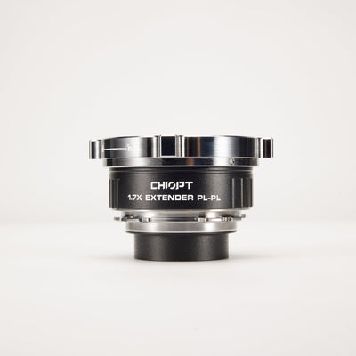 Chiopt 1.7X Extender mounted on cinema lens, increasing focal length and expanding image coverage for professional filmmaking setups.