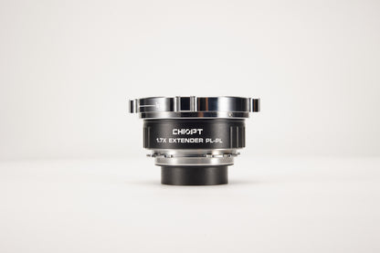 Chiopt 1.7X Extender mounted on cinema lens, increasing focal length and expanding image coverage for professional filmmaking setups.