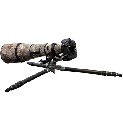 Fotopro E7 heavy-duty tripod fully extended for low-angle shooting, legs spread almost flat for ground-level photography, ideal for macro, wildlife, and bird photography in uneven or rugged terrain.