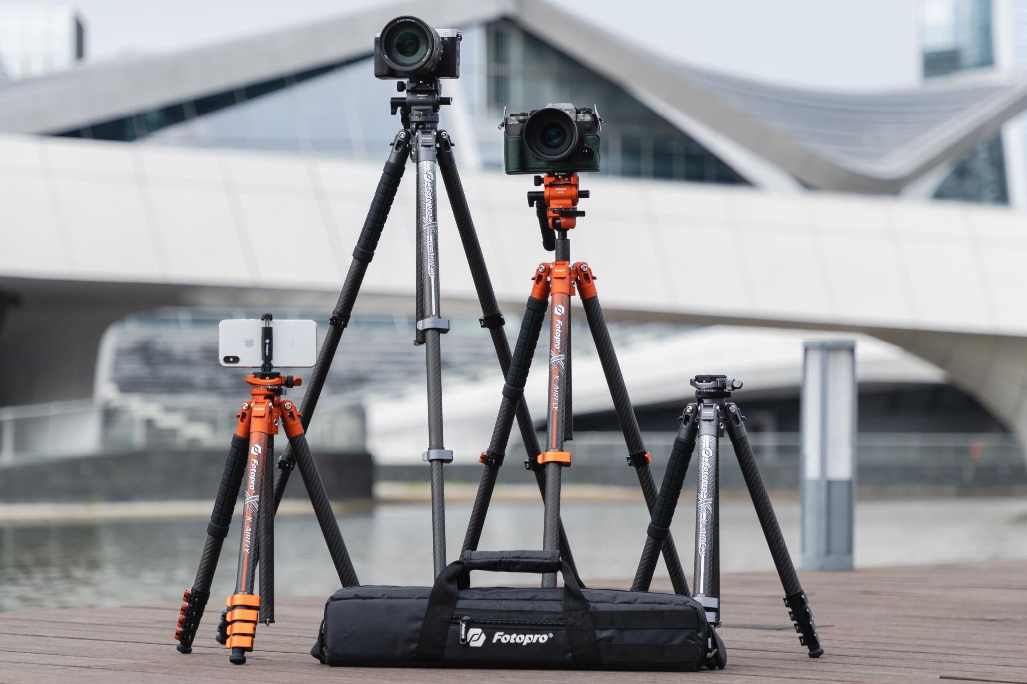 Fotopro X-Airfly series lightweight travel tripods for camera and phone including X-Airfly, X-Airfly Video, X-Airfly Max, and X-Airfly Max Video, come with detachable monopod, hidden phone holder, carrying bag and other necessary accessories.