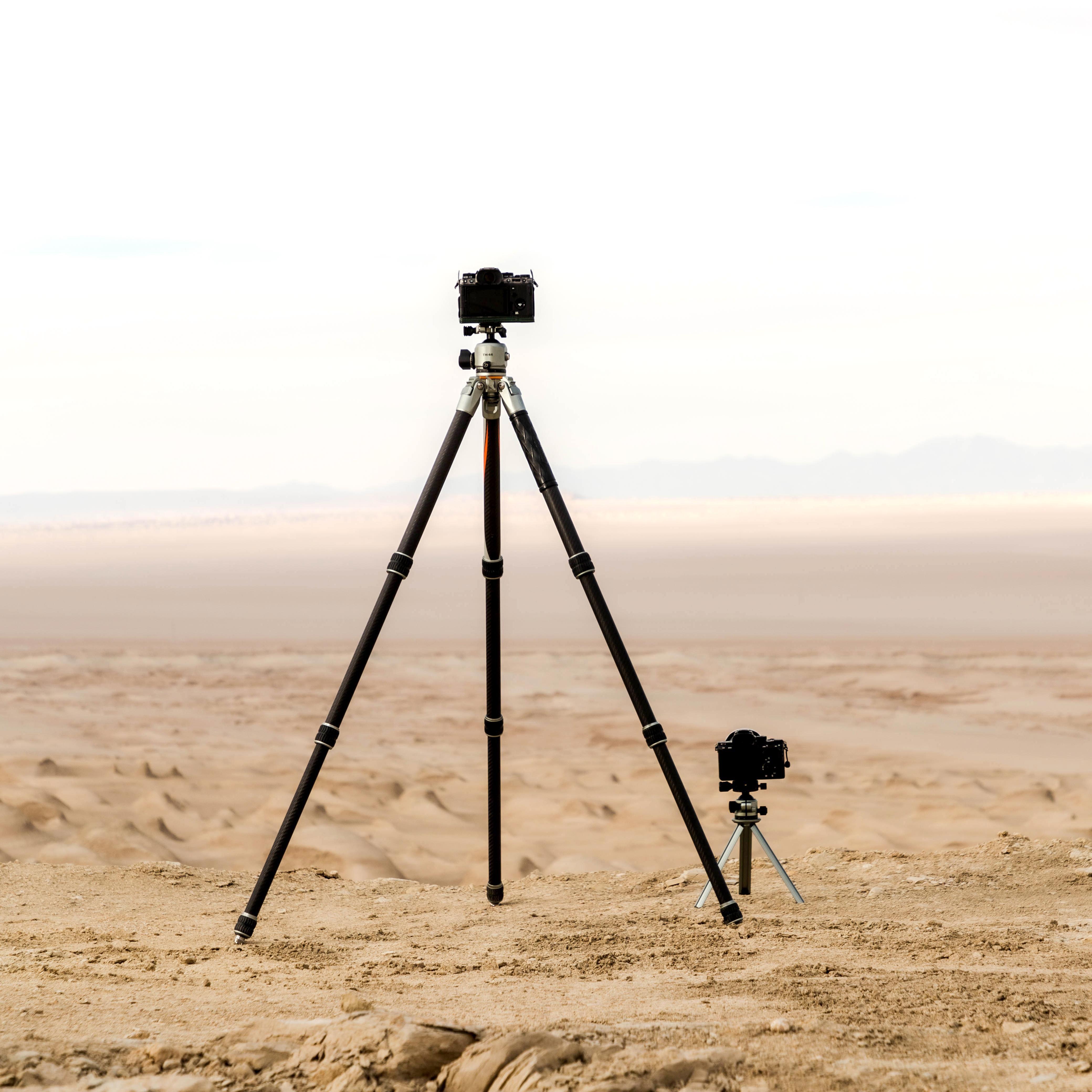 Capture stable images in challenging environments with the all-terrain Fotopro Pantour T1 Plus carbon fiber travel camera tripod. The T-Stand center column used as mini tripod for low-angle shots, sandproof, dustproof, designed for harsh environments. Stable and lightweight tripod for DSLR, mirrorless, and cine cameras.